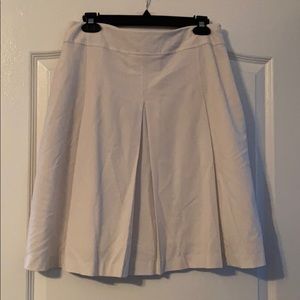 White pleated skirt